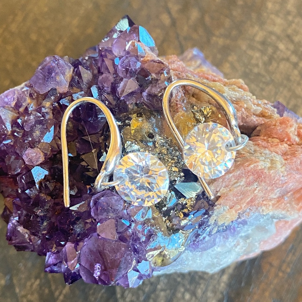 - Sterling silver hook style “bling” earrings.